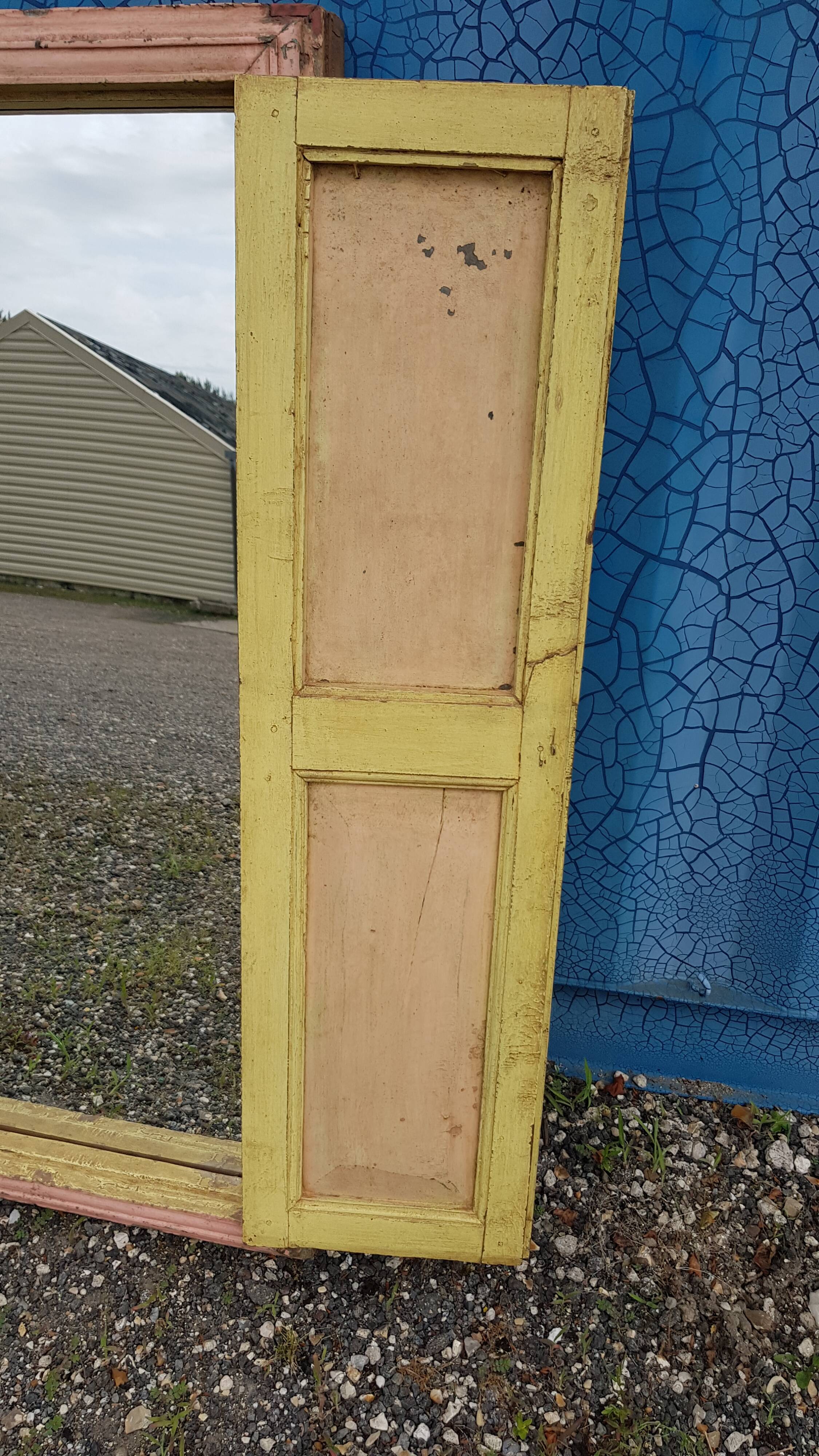 Old polychrome Burmese teak window with interior mirror.