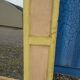 Old polychrome Burmese teak window with interior mirror.