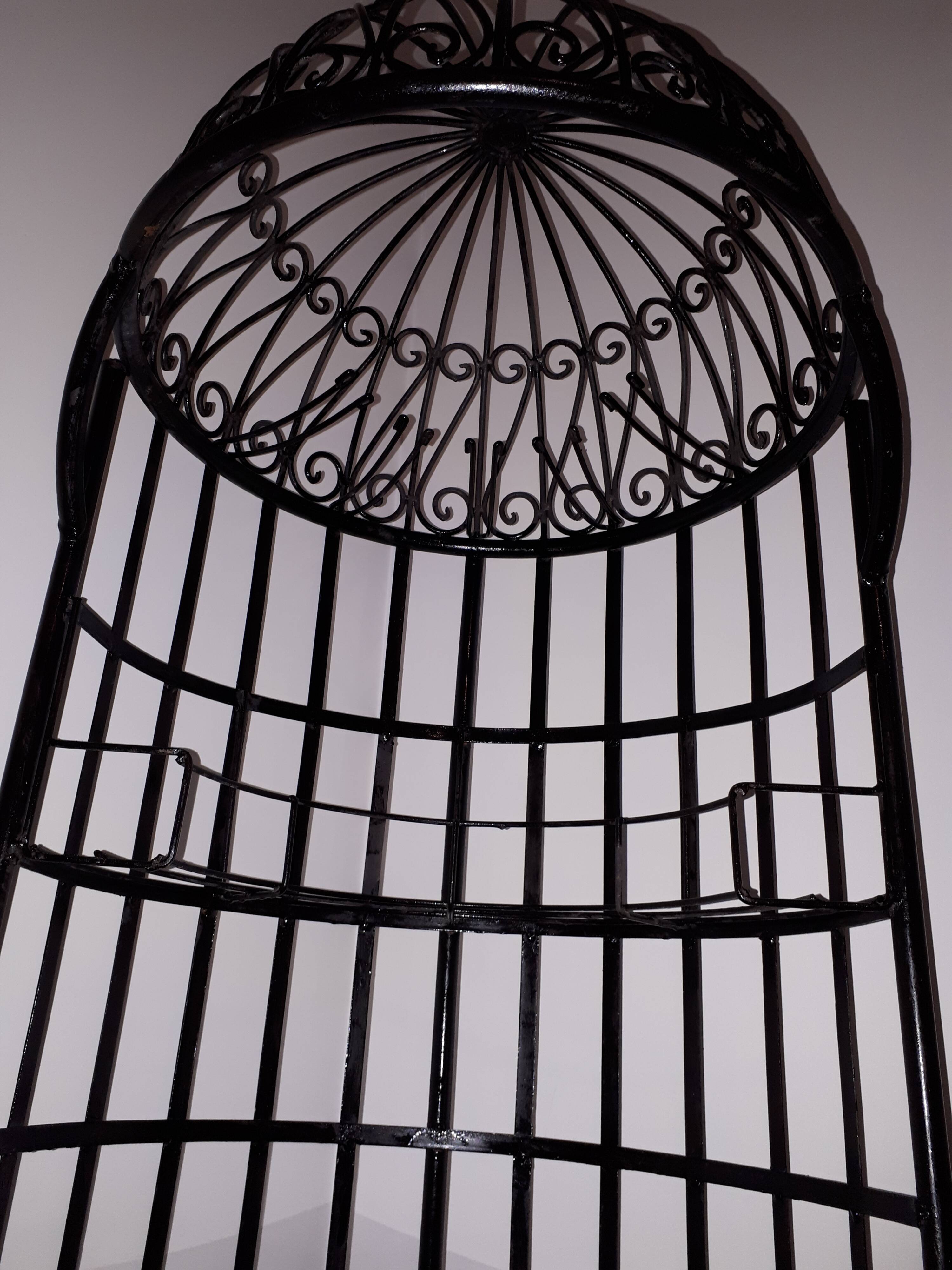 Wrought iron bar with bottles holder