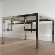 Pair of chrome designer side tables