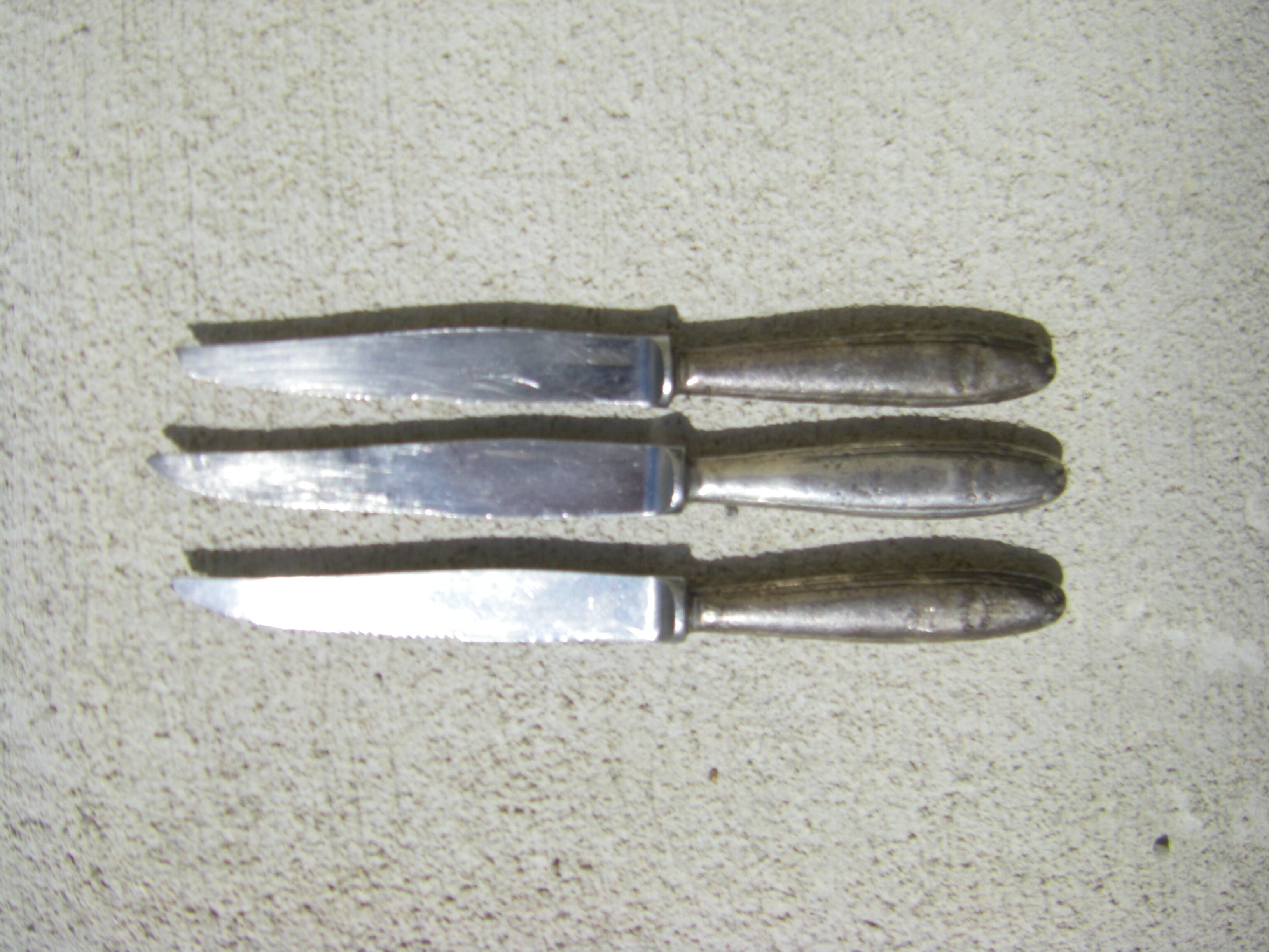 Set of three antique Christofle knives from the Carlton Hotel