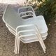 Perforated metal armchairs