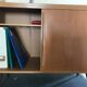 Vintage storage cabinet sliding doors feet compass