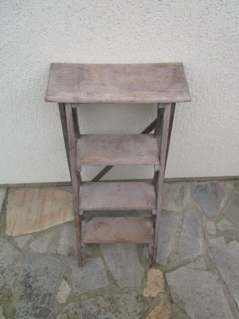 Stepladder of old wooden painted