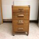 Old curtain oak wheeled box 1950