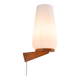 Wall lamp with opal glass shade on wooden base by Philips