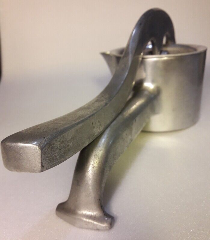 Vintage grapefruit metal citrus press