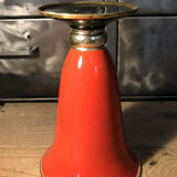 Cut vase on foot in red and black metal