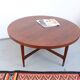 Vintage teak coffee table in 60s-70s style, retro style.