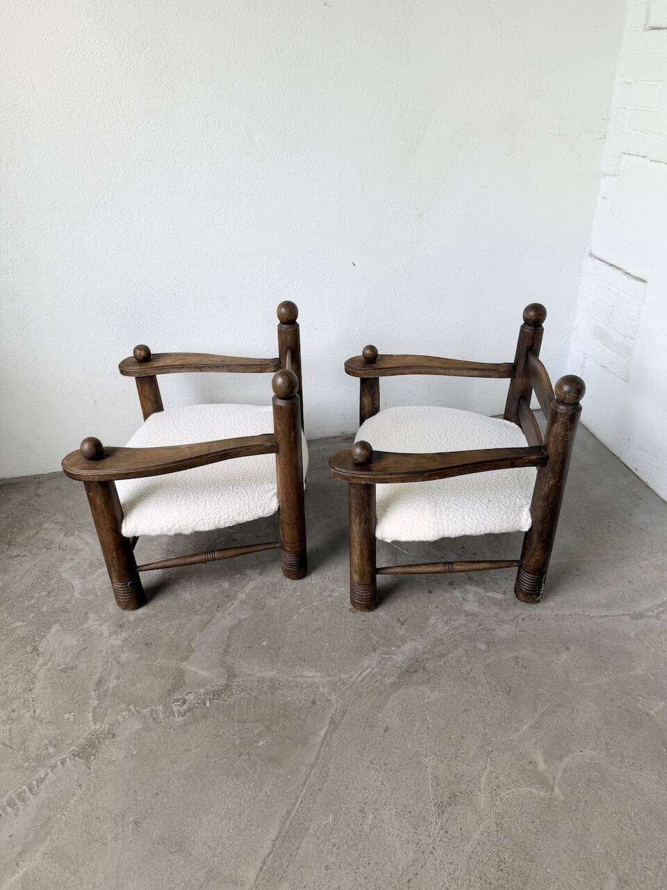 Pair of Dudouyt armchairs from the 1950s, oak.