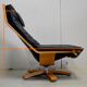 Leather and beech relaxation chair - 1970 / 1980
