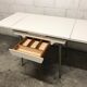 Off-white formica table / 70s cream with a tapered foot drawer
