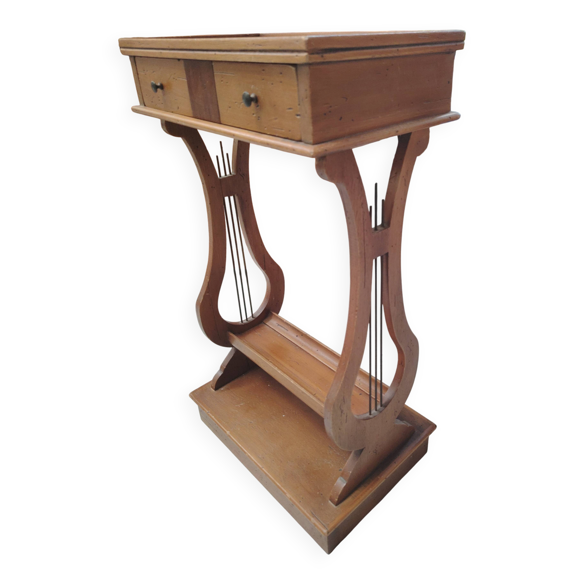 Vintage end table with lyre legs and two drawers.