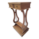 Vintage end table with lyre legs and two drawers.