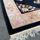 Superb vintage Chinese rug in black wool. Beijing, circa 1950