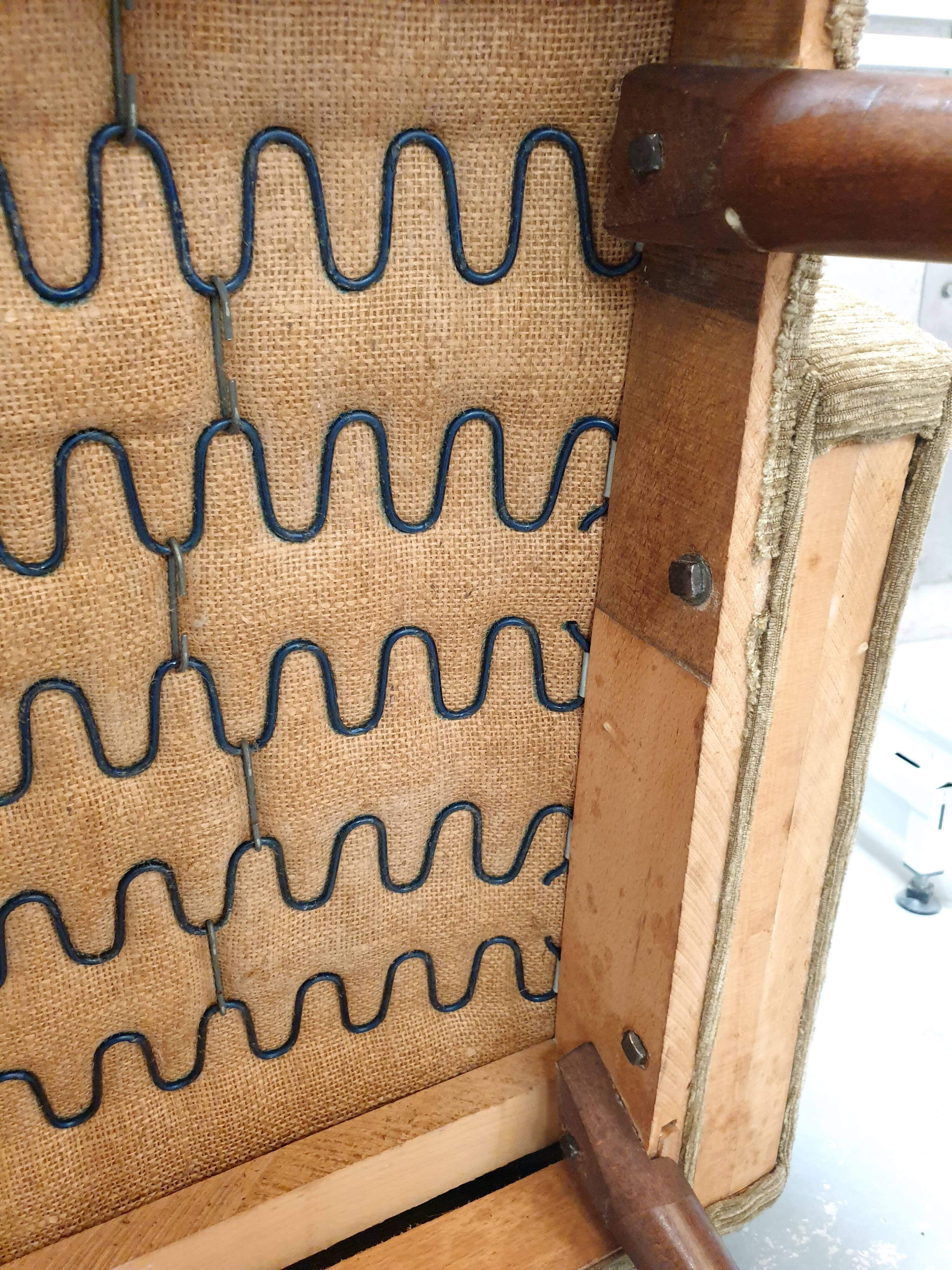 Paire de fauteuils scandinaves accoudoirs rehaussés années 50/60 vintage