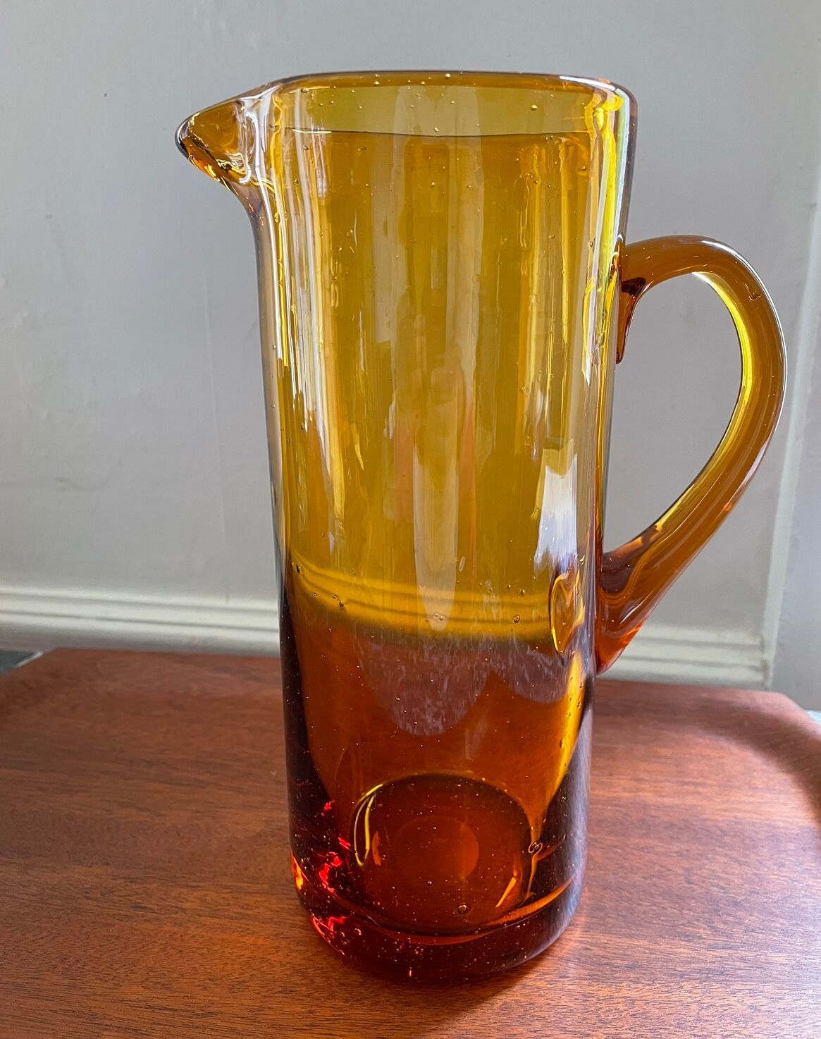Amber pitcher bubbled glass