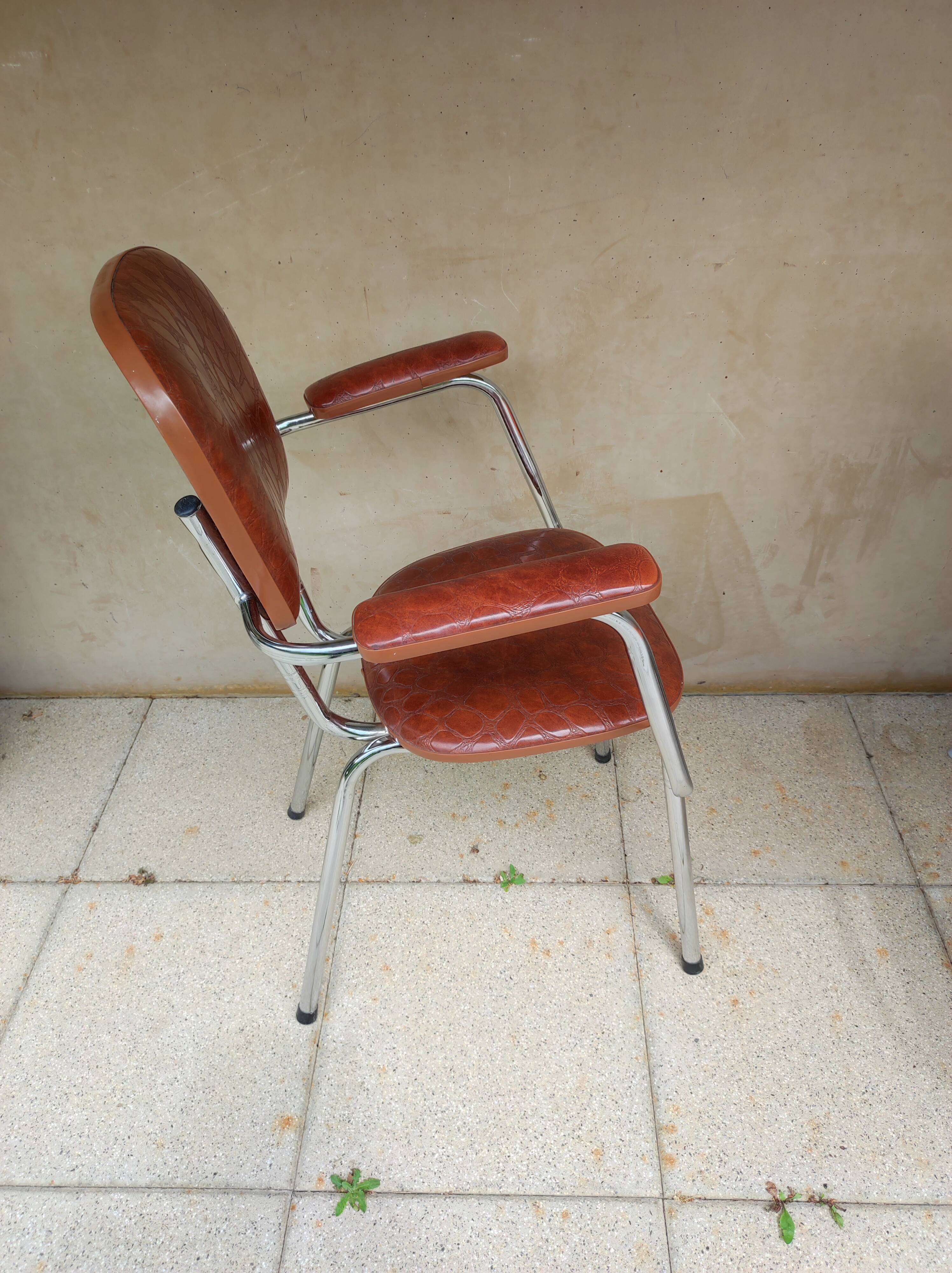 Stainless steel skaï armrest chair from 1958