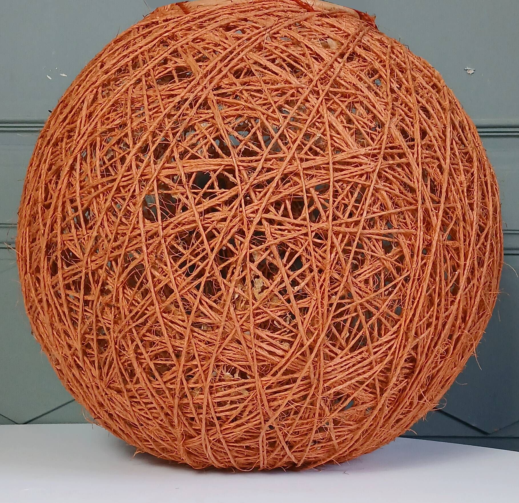 Orange lampshade in cord and rattan from the 1970s