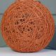 Orange lampshade in cord and rattan from the 1970s
