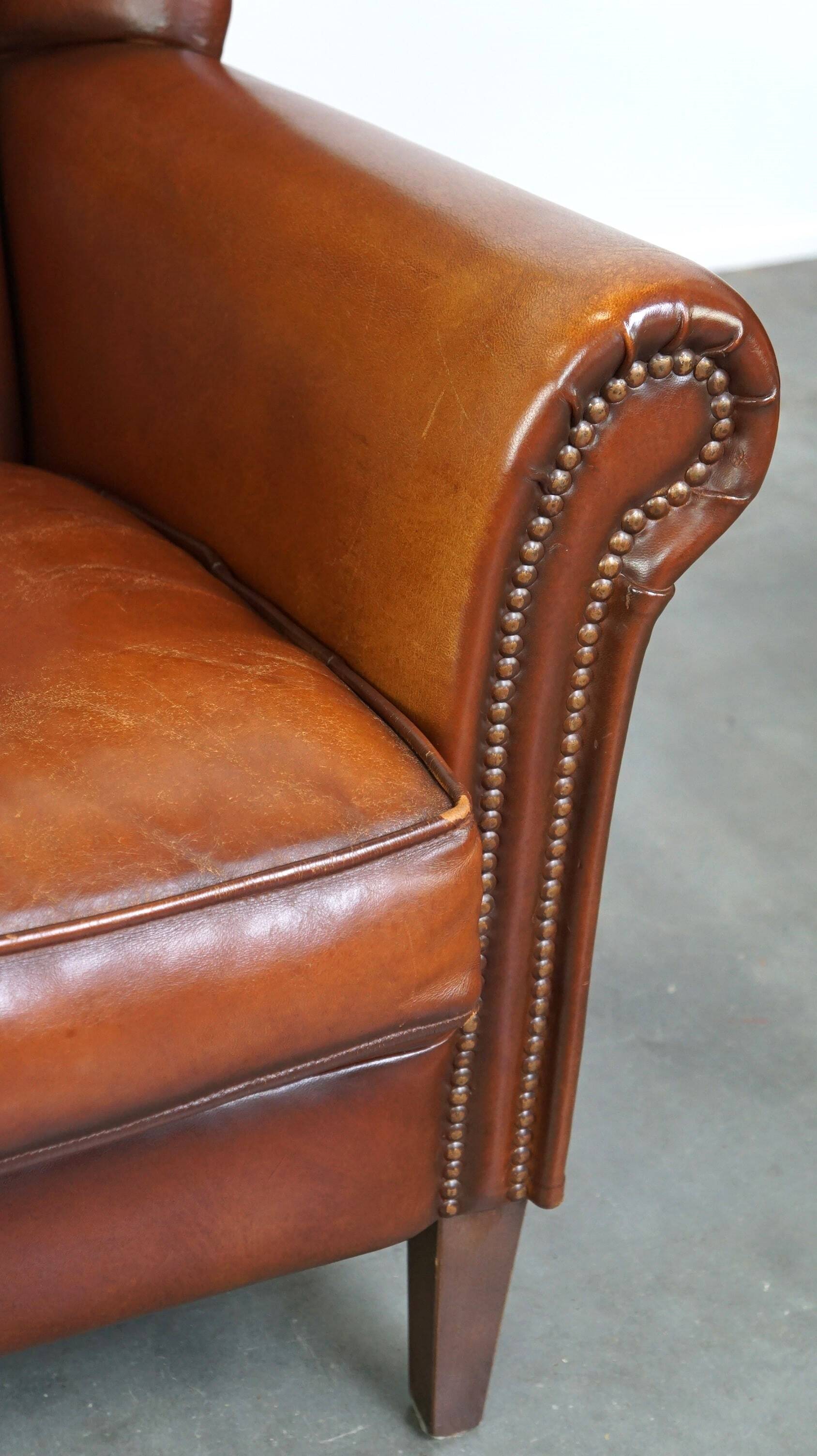 Beautiful classic sheepskin armchair with a beautiful appearance and a comfortable seat