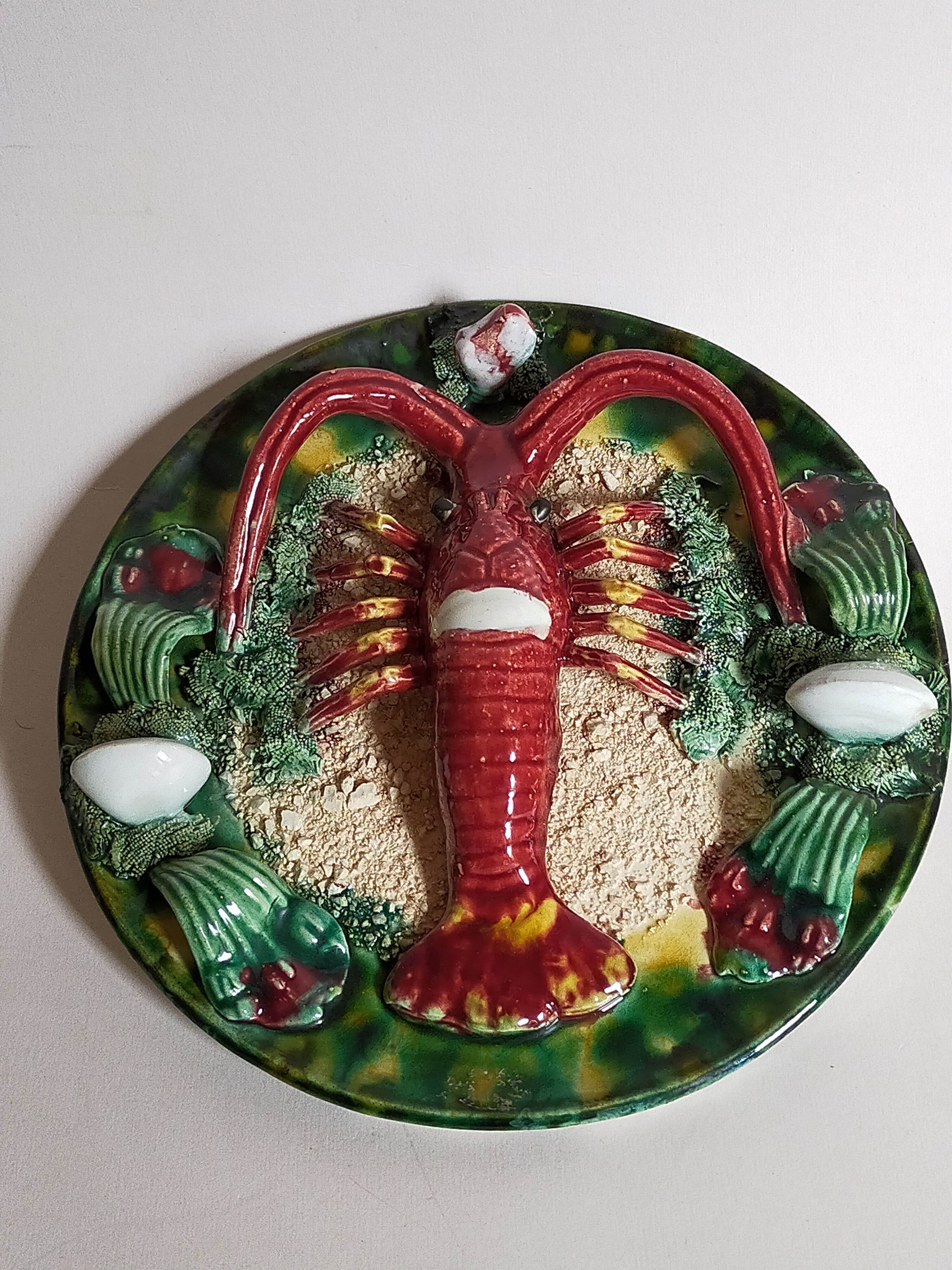Plate in old barbotine with lobster