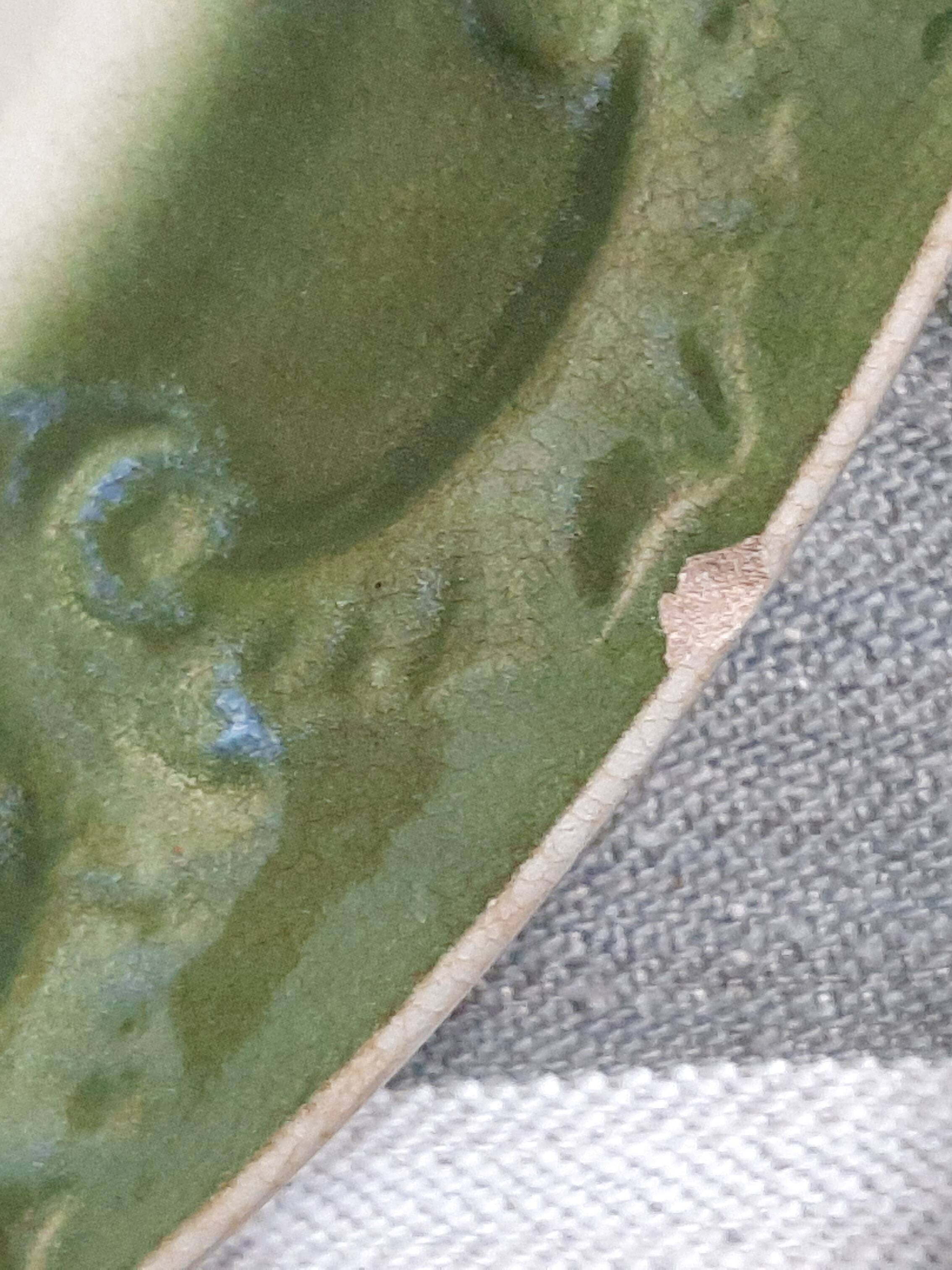 Antique earthenware plates with fruit decoration.