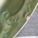 Antique earthenware plates with fruit decoration.