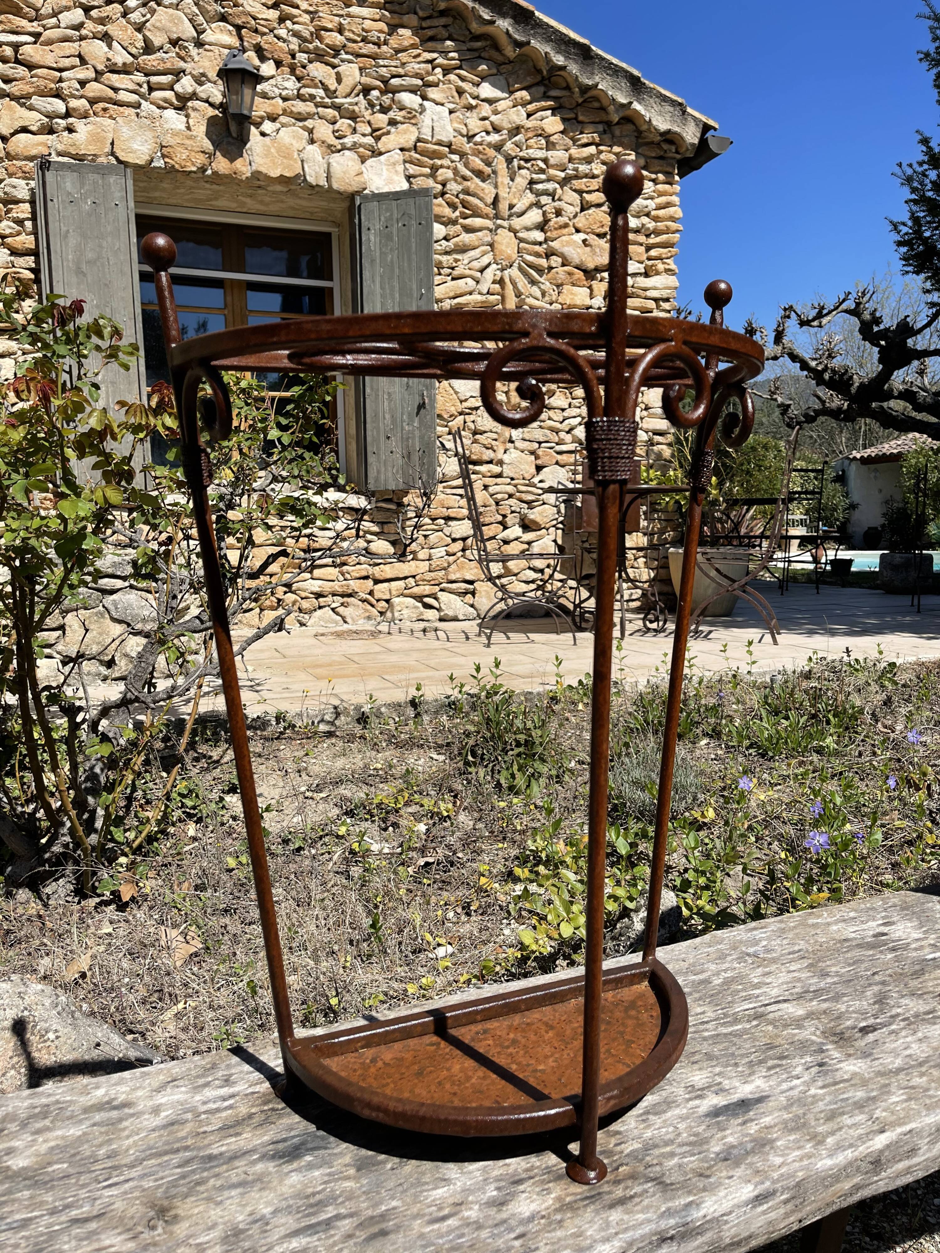 Wrought iron umbrella holder