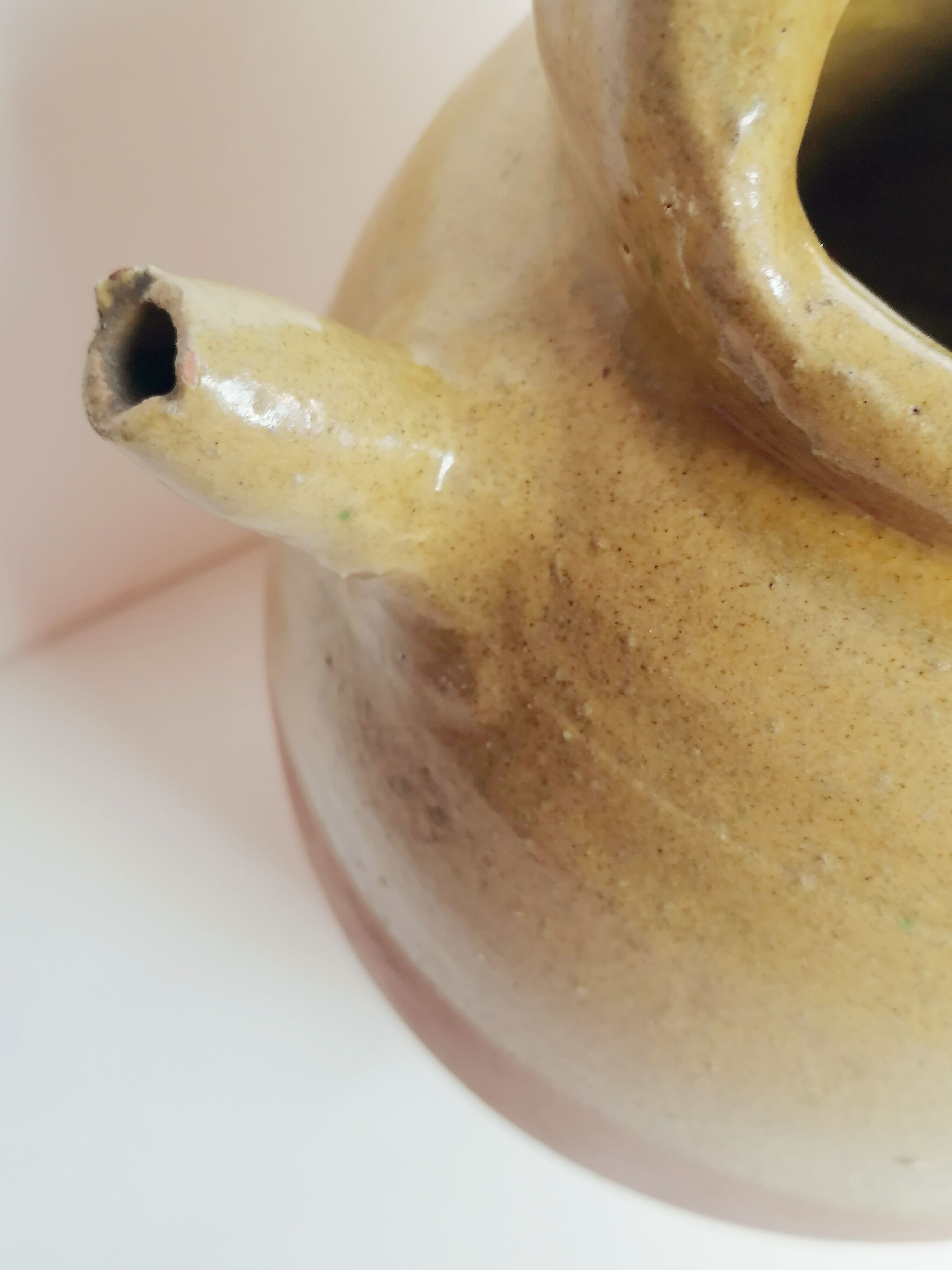 Yellow enamelled gargulette jug