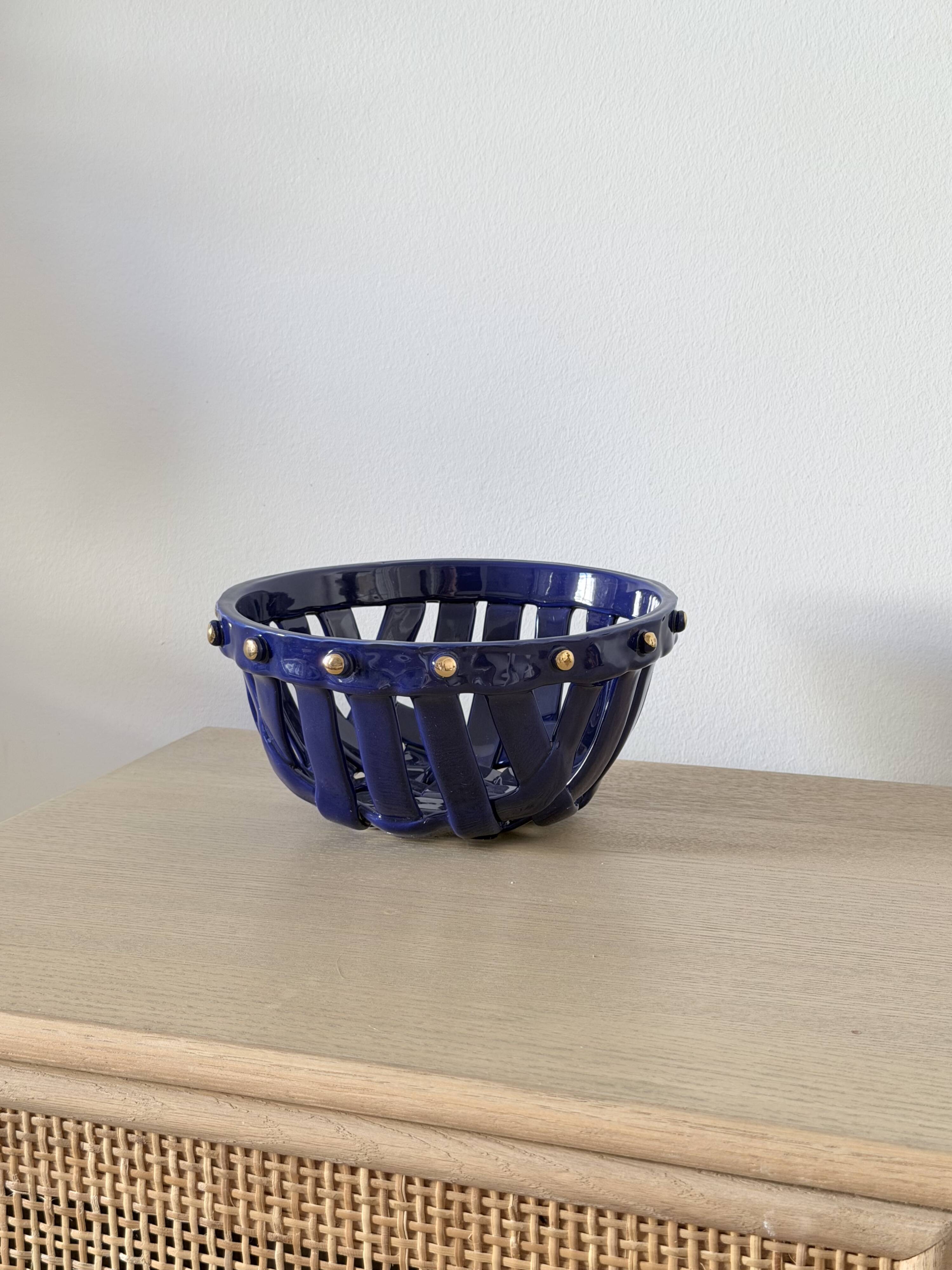 Large cobalt blue openwork bowl with golden studs