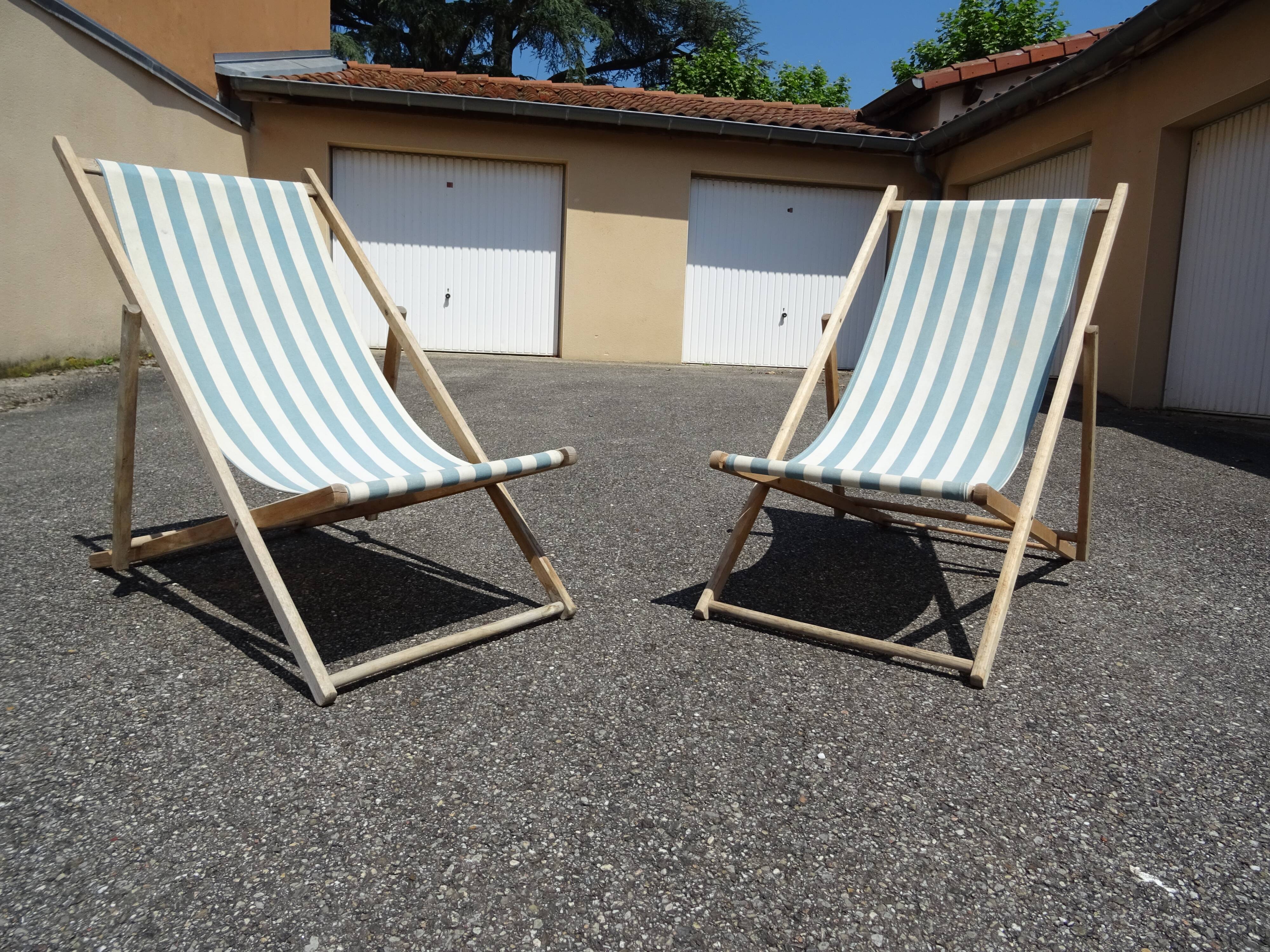 Pair of sun loungers with vintage blue blue stripes