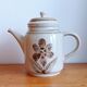 Antique coffee pot in handcrafted stoneware