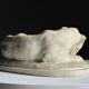 Marble sculpture of a reclining lion