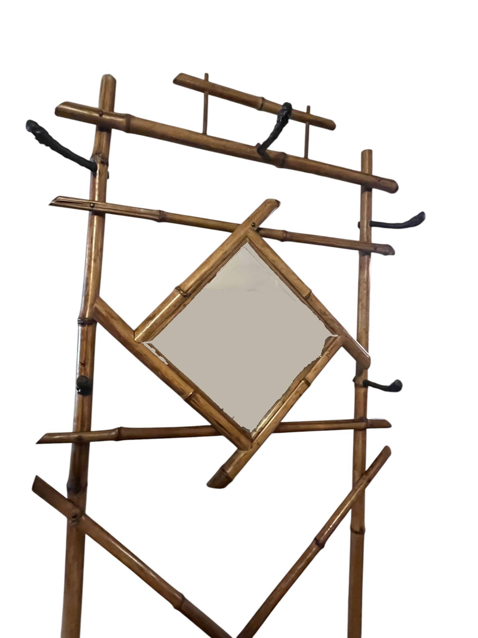 Art Deco, coat rack with bamboo mirror, diamond shape, around 1930.