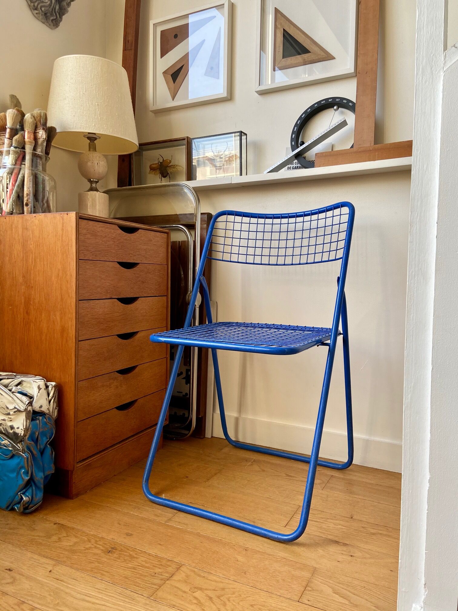 Blue "Ted Ned" folding chair by Niels Gammelgaard