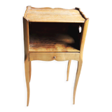 Old wooden bedside table heart pattern