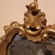 Vintage gold mirror sconces from the late 1950s.