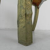 Dining chair upholstered with stamped tin