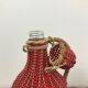 Bottle with rattan weaving and vintage scoubidou