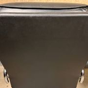 Chrome leather footrest in Danish design by Unico