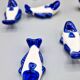 Set of 11 vintage blue and white porcelain fish knife rests.