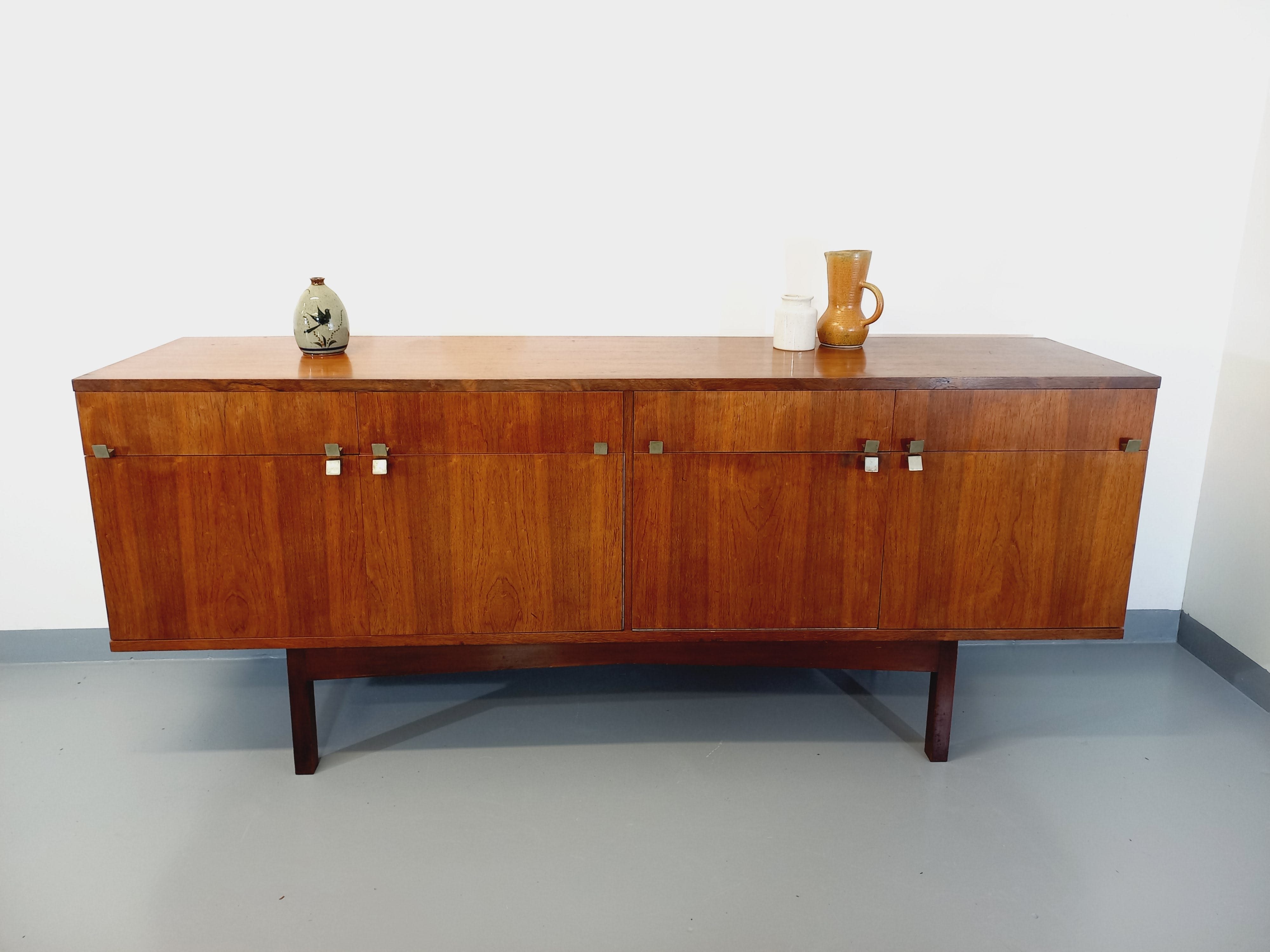 Vintage Scandinavian style row in rosewood and brass from the 60s