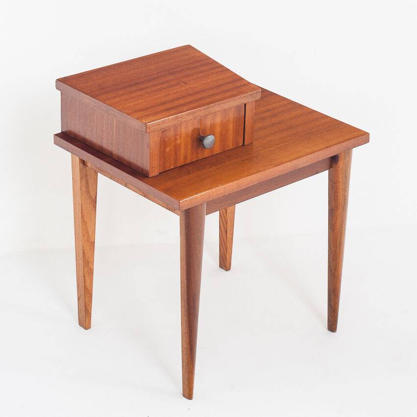 Vintage bedside table. Varnished wood. France, 1960s.
