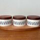 Sets of Swedish herring pots in ceramic and teak by Asa Lindberg for Sagaform, 2000s, set of 4.