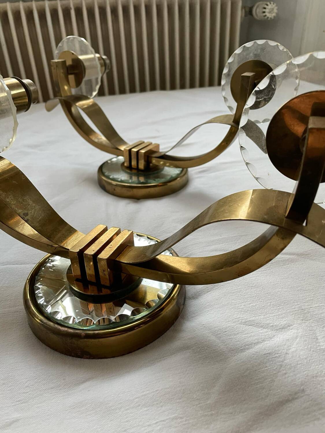 Vintage pair of art deco brass and mirrored glass wall lights France 1940