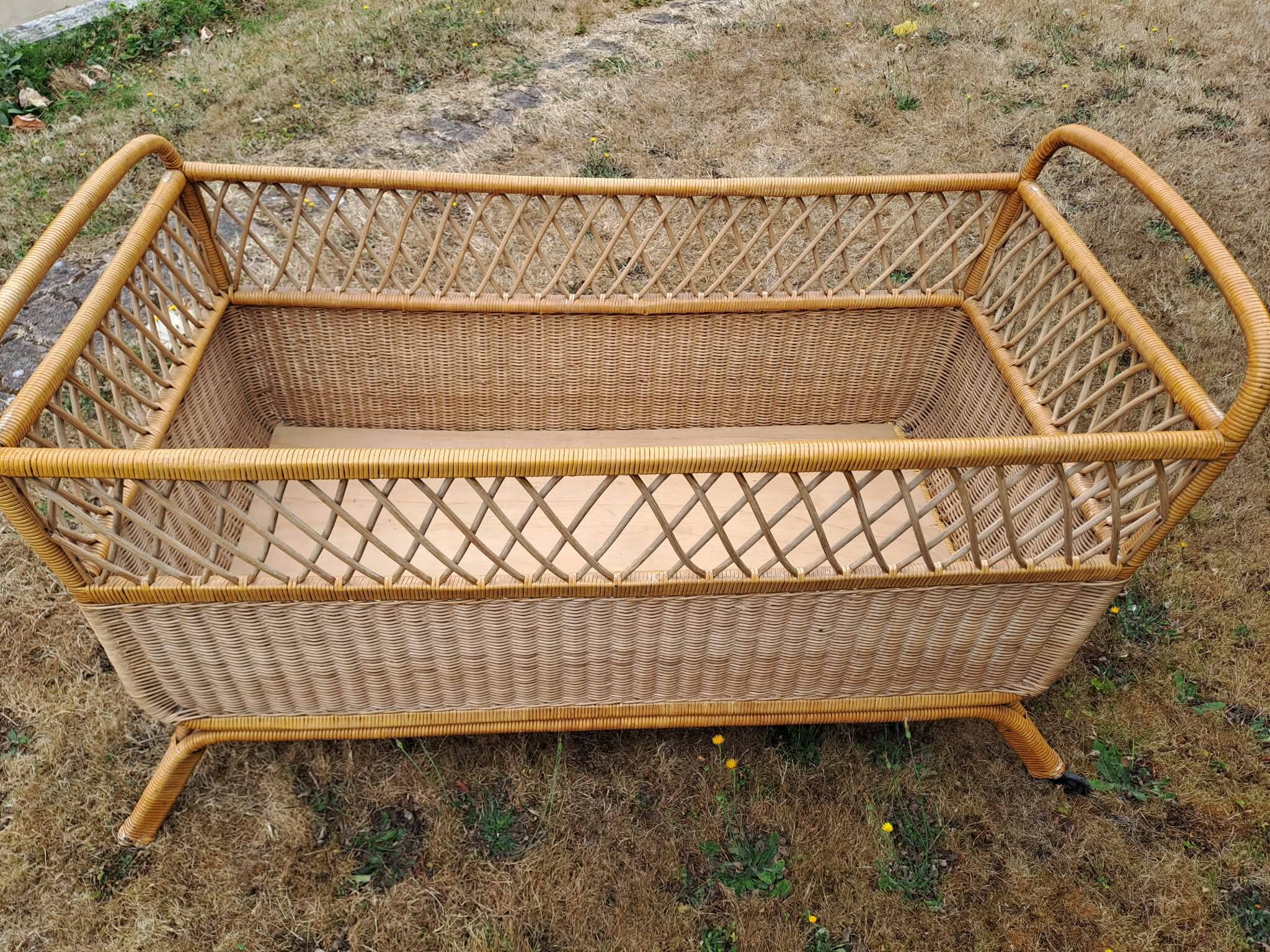 Rattan cradle.