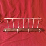 Vintage wall-mounted coat rack made of plywood and aluminum with hat rack
