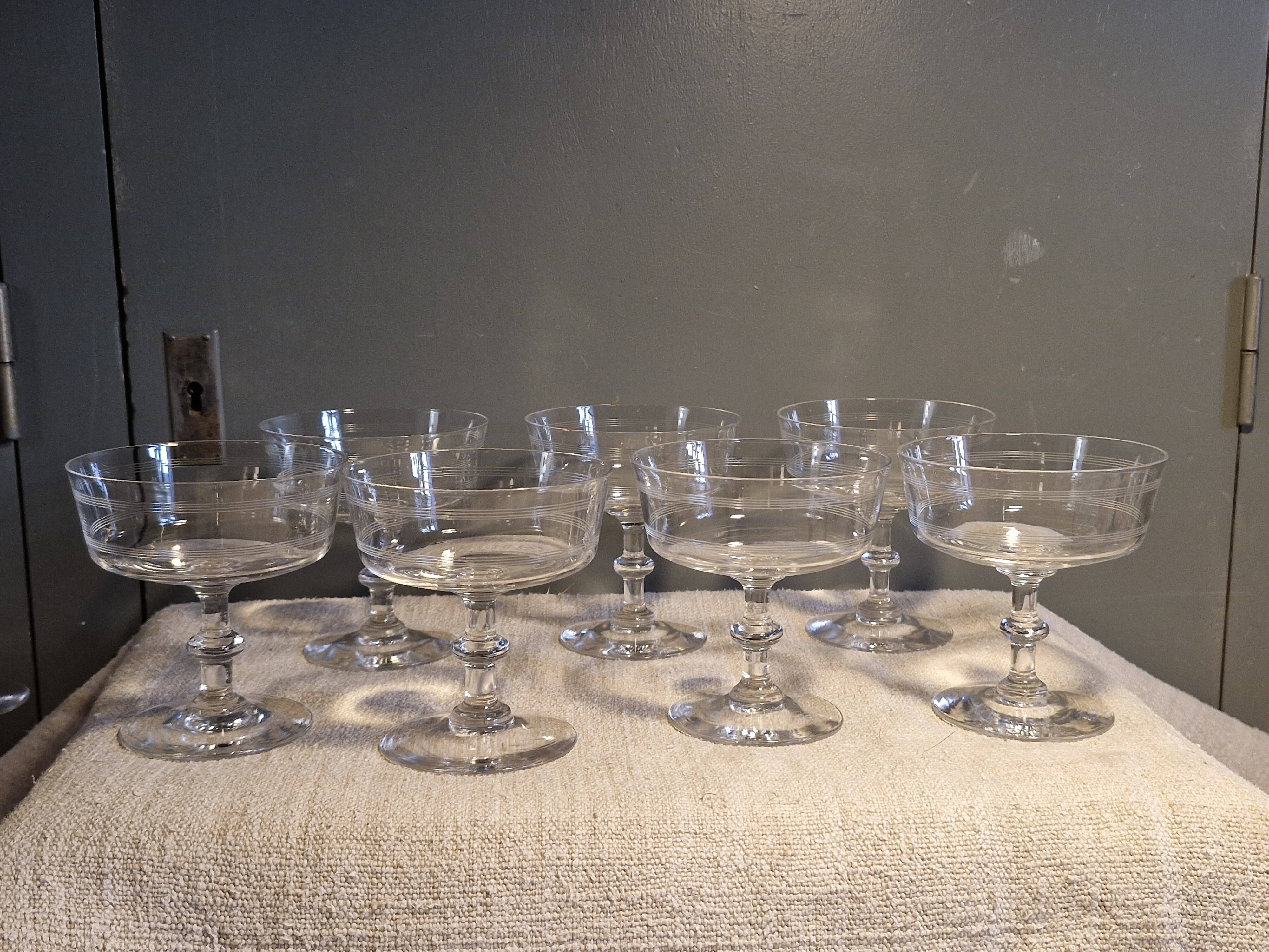 7 crystal champagne coupes from Baccarat - engraved with fillets