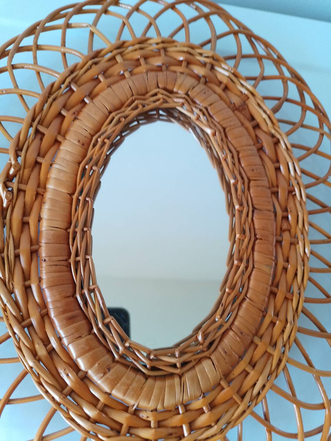 Woven rattan mirror